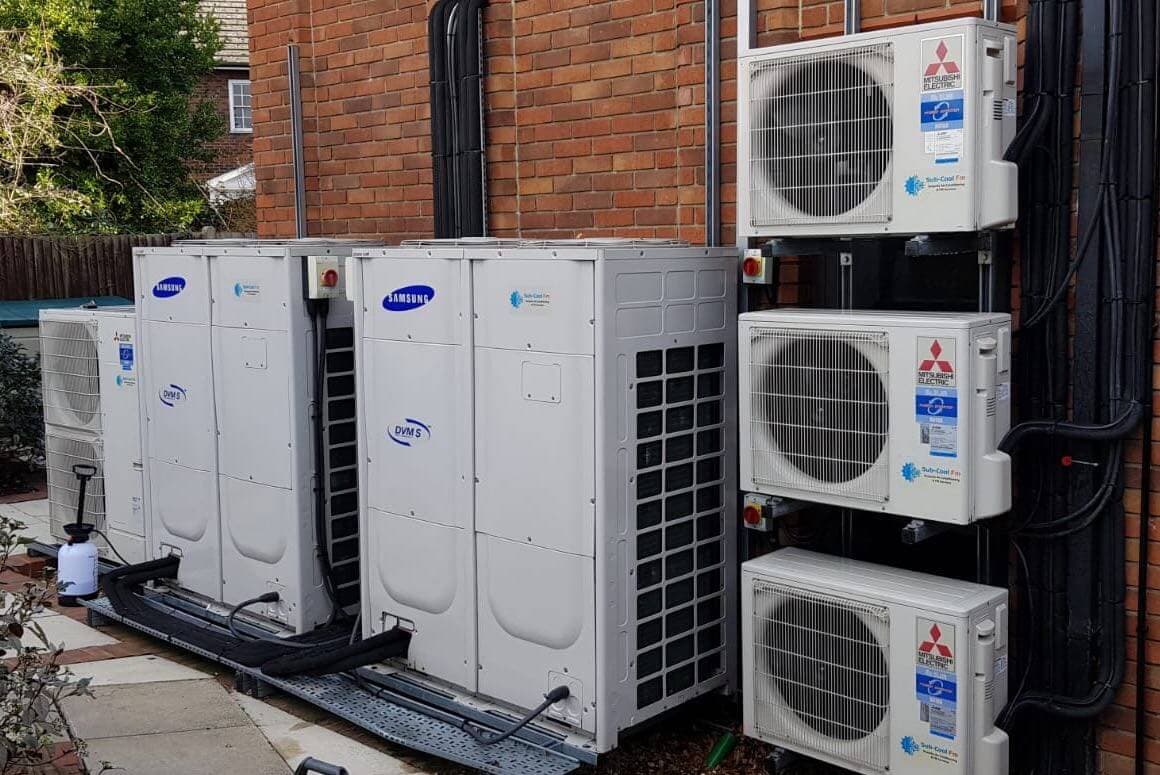 Large multiple exterior air conditioning units from Mitsubishi Electric and Samsung fitted by SubCoolFM neat pipework