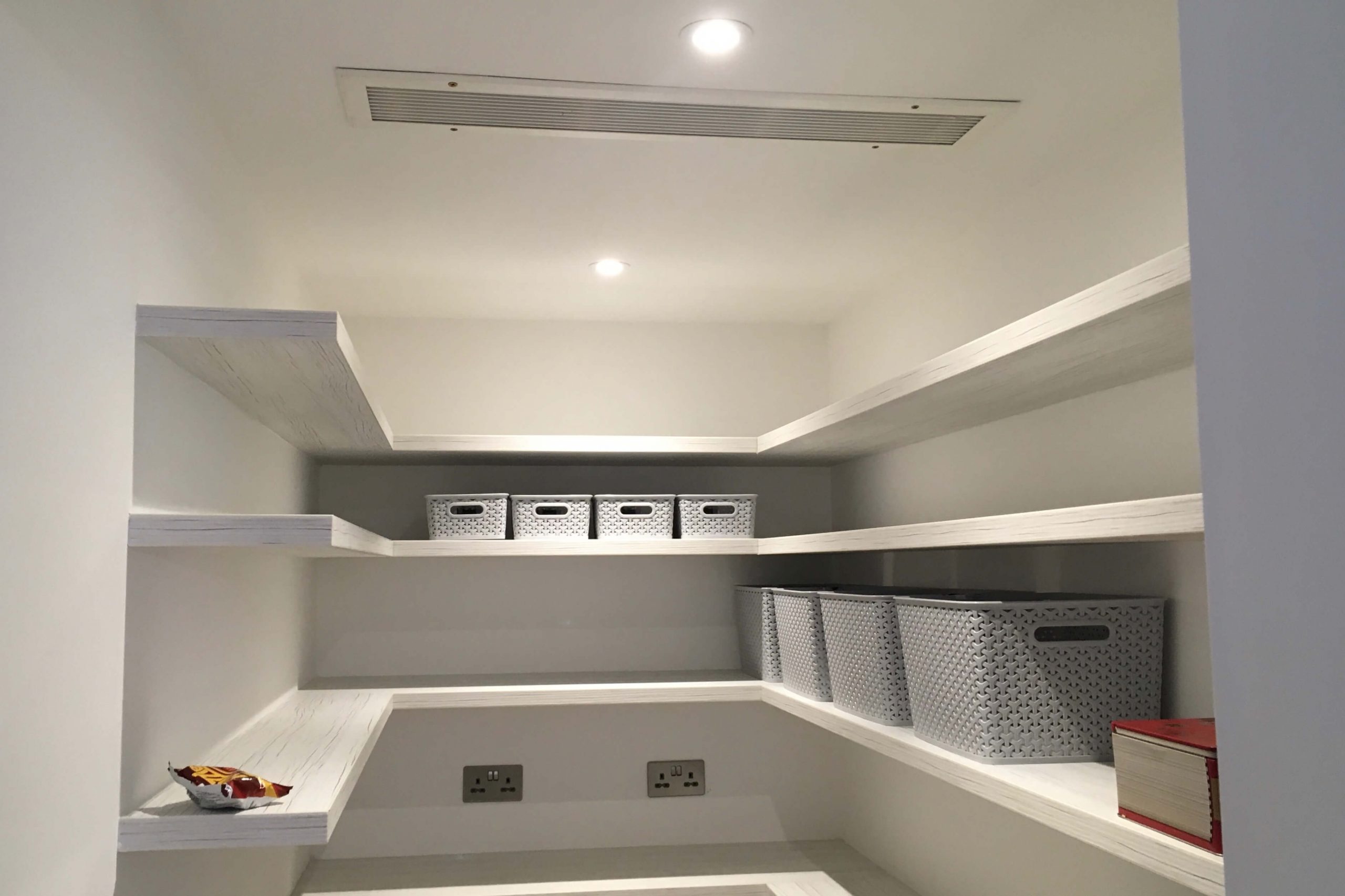 Scandia Hus with Mitsubishi air con and a full MVHR system by SubCool FM - inside the hidden chill room / larder