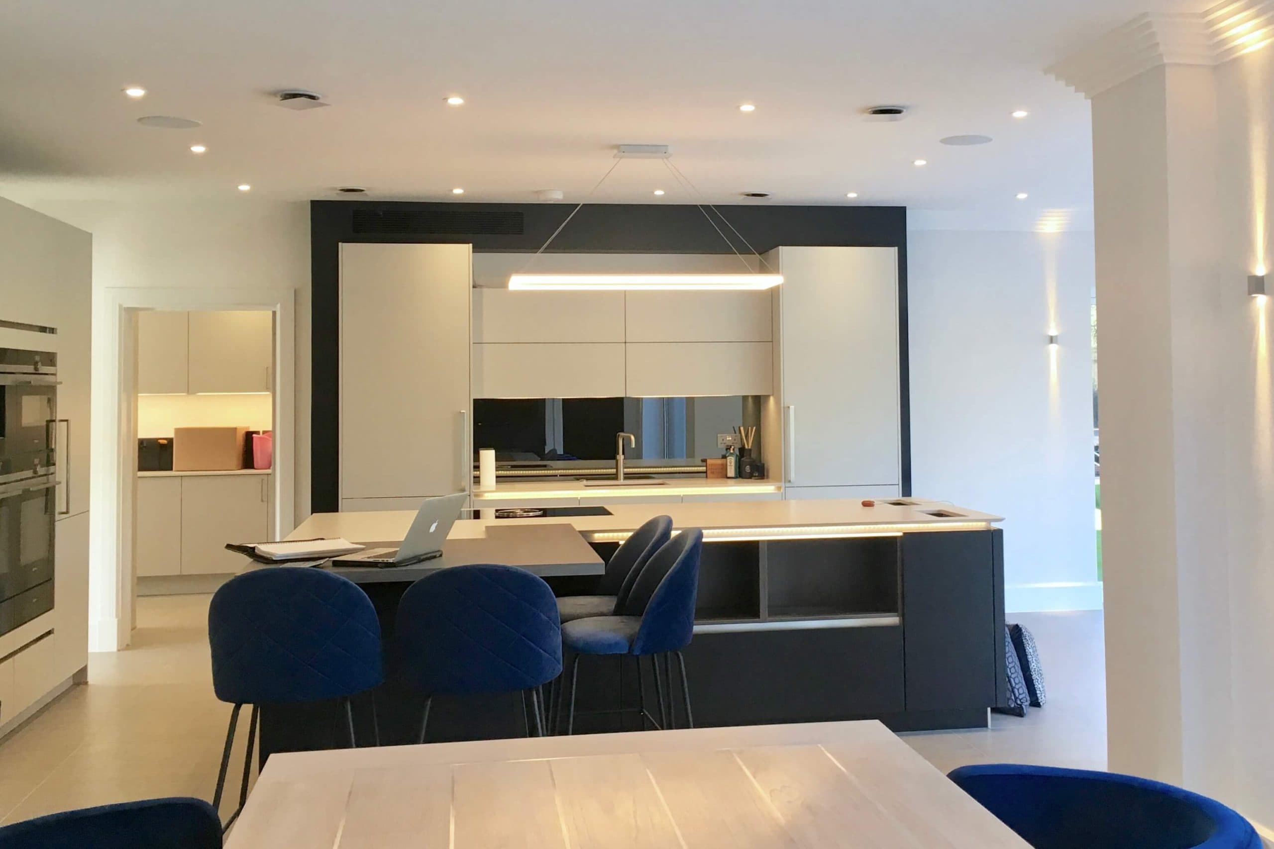 Scandia Hus new build kitchen with invisible Mitsubishi air con grill and MVHR system by SubCool FM view from dining area