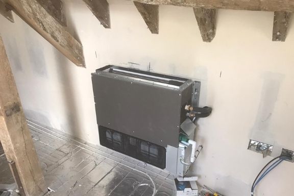 air conditioning wall unit in barn conversion